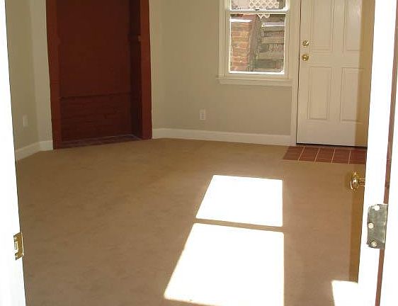 Spacious, sunny bedroom - walk out to rear of house.