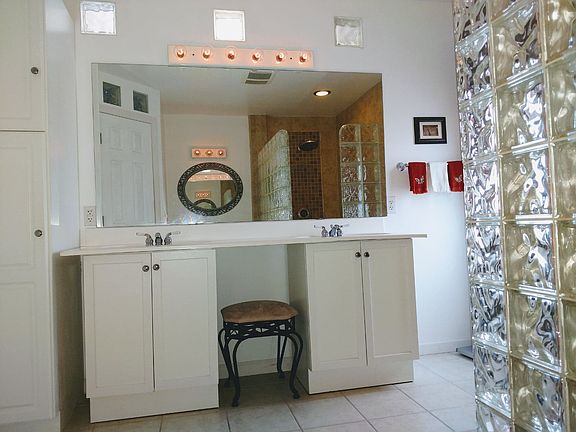 Double sinks, walk-in shower