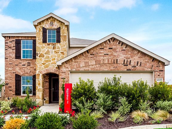 The Mesilla, a two-story home with 2-car garage, shown with Home Exterior R