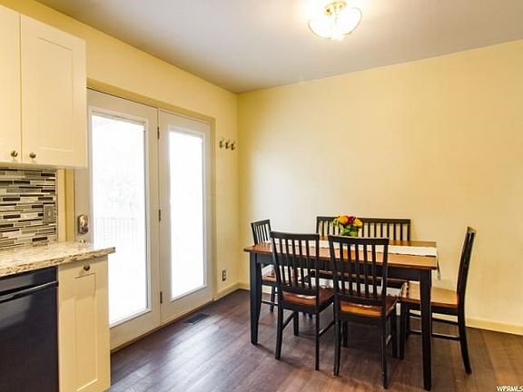 French doors lead to deck and backyard