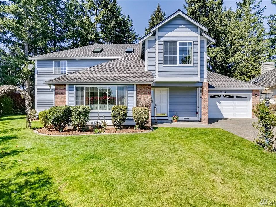 Unbelievable street appeal!  English Garden beauty tucked into cul de sac with a long driveway