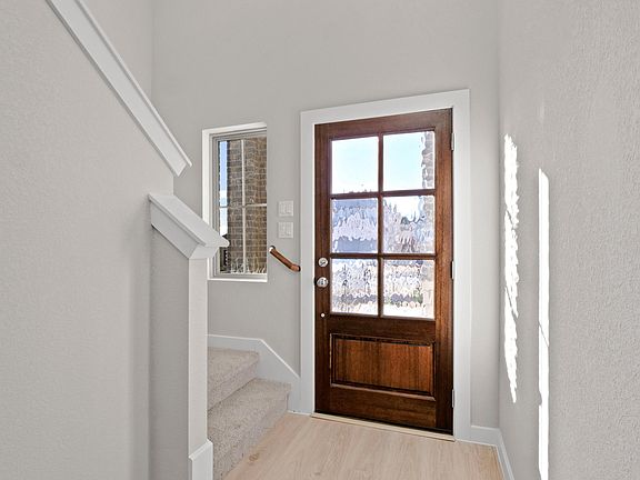 Entryway in the Willow home plan by Trophy Signature Homes - REPRESENTATIVE PHOTO