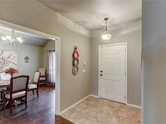 Entry looking into the flex space.  They are using for a second dining but could be used as a living room, game room or another office.
