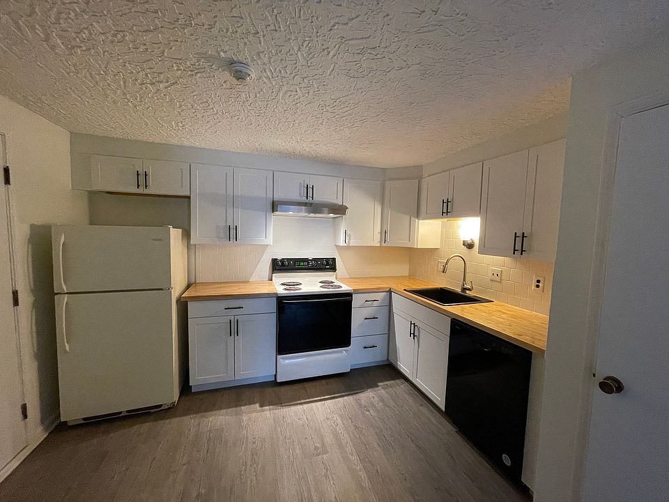 Eat-In Kitchen, new countertops, cabinets, hood, dishwasher, and flooring.
