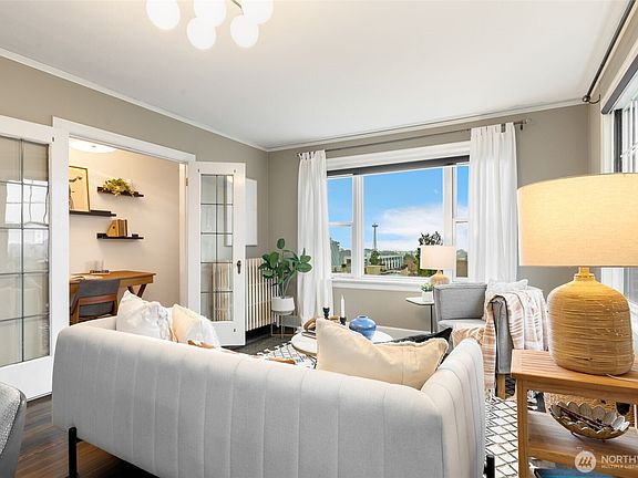 4th image of 711 Belmont Place E #303