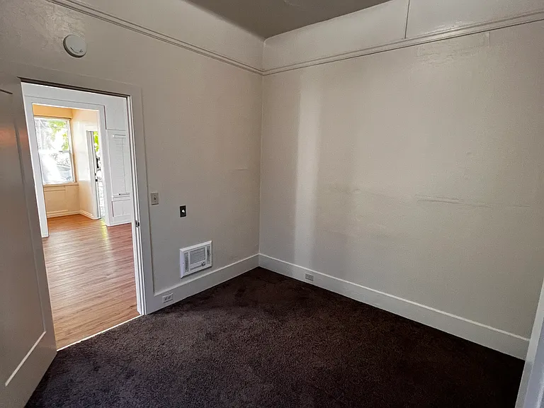 bedroom located in rear of unit