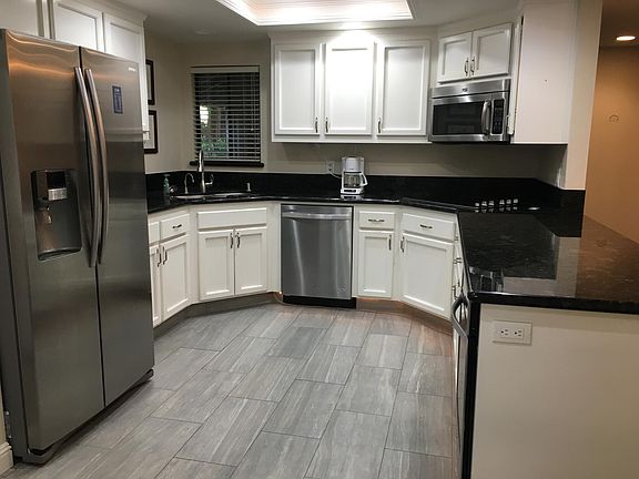 Recently remodeled kitchen with granite countertops