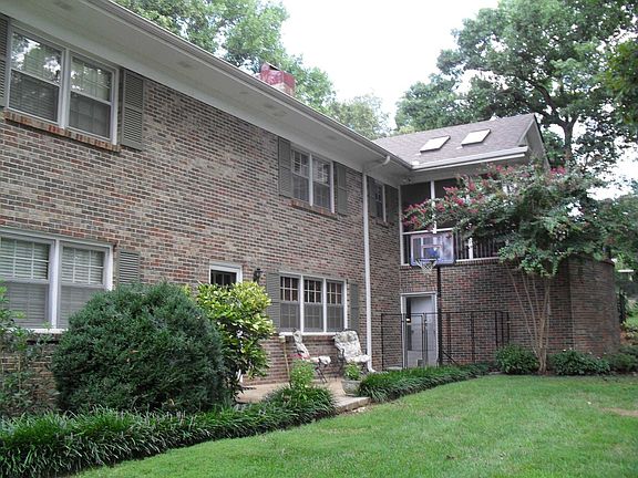 Elevated rear of house has mountain views