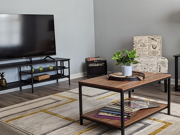 The living space has plenty of room for you and your guests to put your feet up and enjoy each other while chatting or watching TV. The living room TV is a smart TV that can be connected to any of your personal streaming service accounts.
