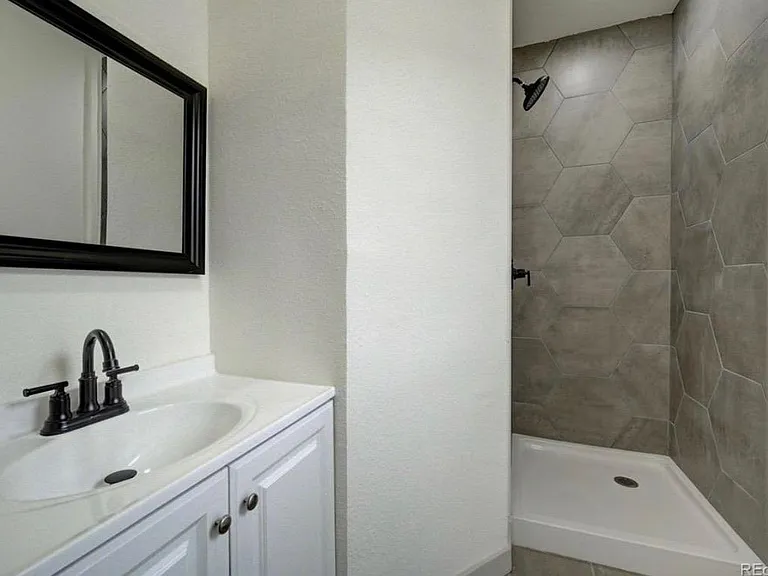 En suite bathroom (bedroom #1)