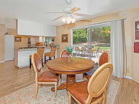 Dining into kitchen and backyard
