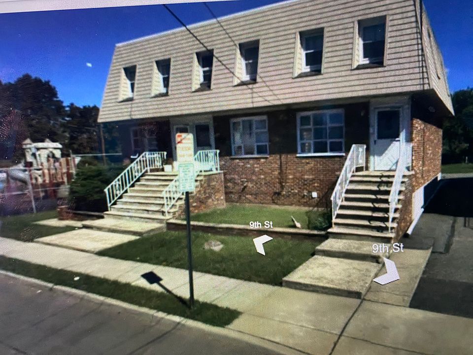 Front of house. Unit is the one on the right. Park is on the left of the building.