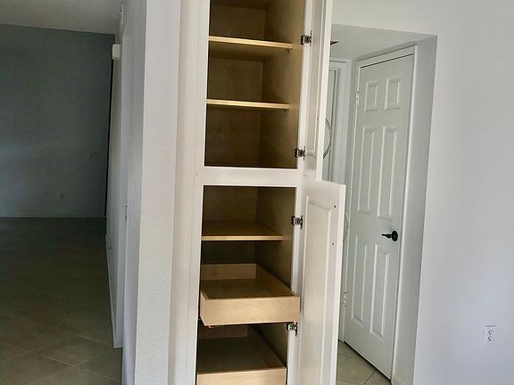 PULL OUT PANTRY; HALL CLOSET; HALF BATH