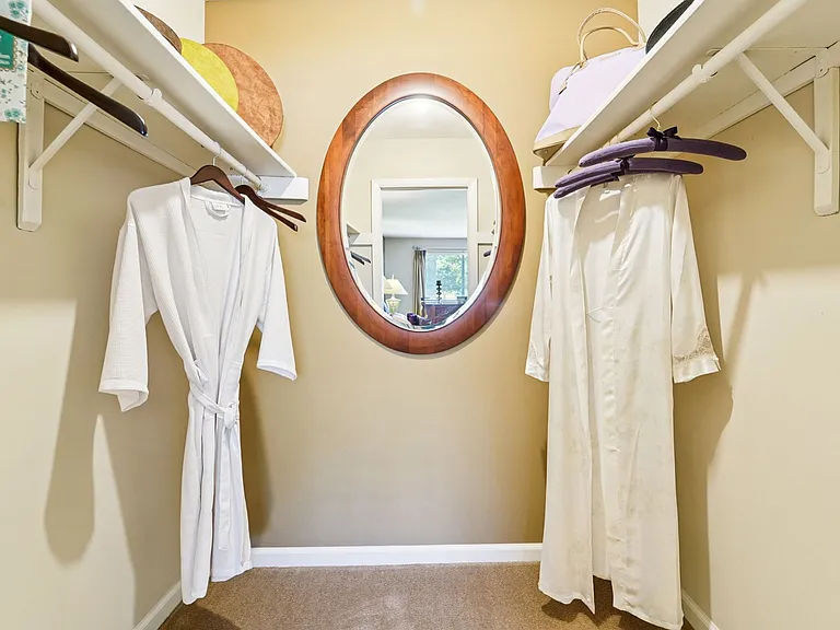 2BR, 1.5BA - 939SF - Model - Master Bedroom Walk-in Closet