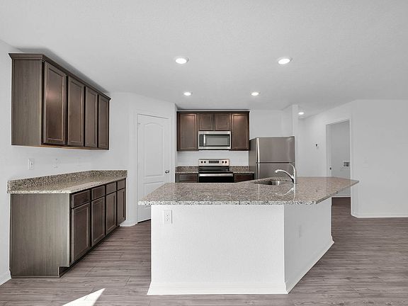 Hosting has never been easier with this beautiful, chef-ready kitchen