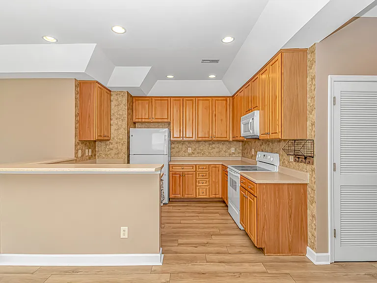 8855 Radcliff Dr NW #17A — Photo 3