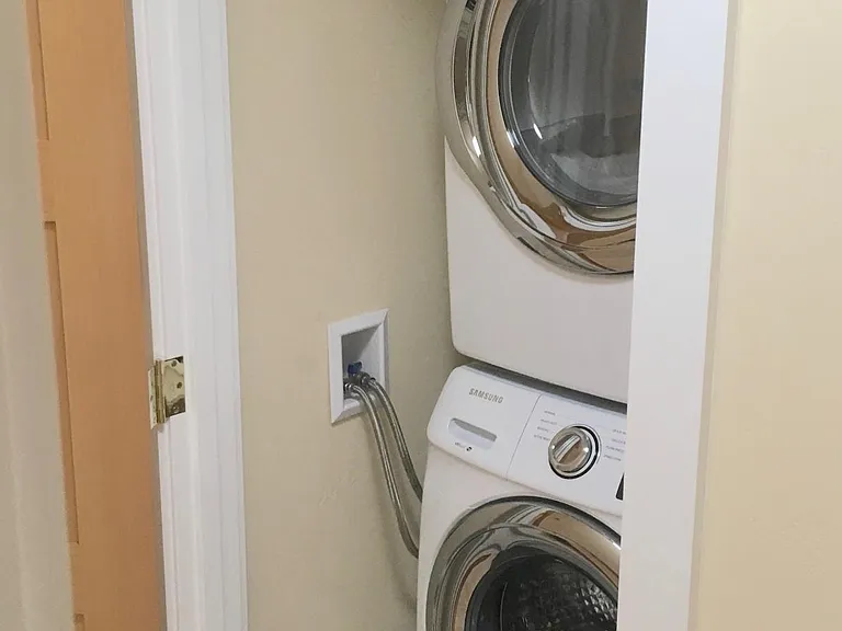 Laundry closet with stacked washer/dryer