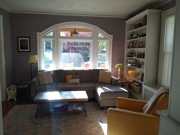 Bright living room with 55" flat screen TV