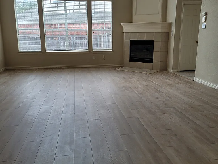 living room with high ceiling