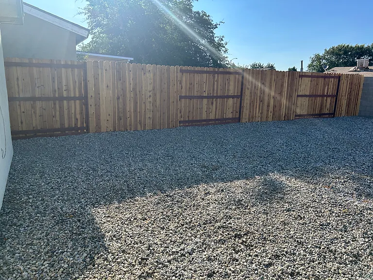 NEW WOODEN FENCE ON BACK YARD WEST SIDE