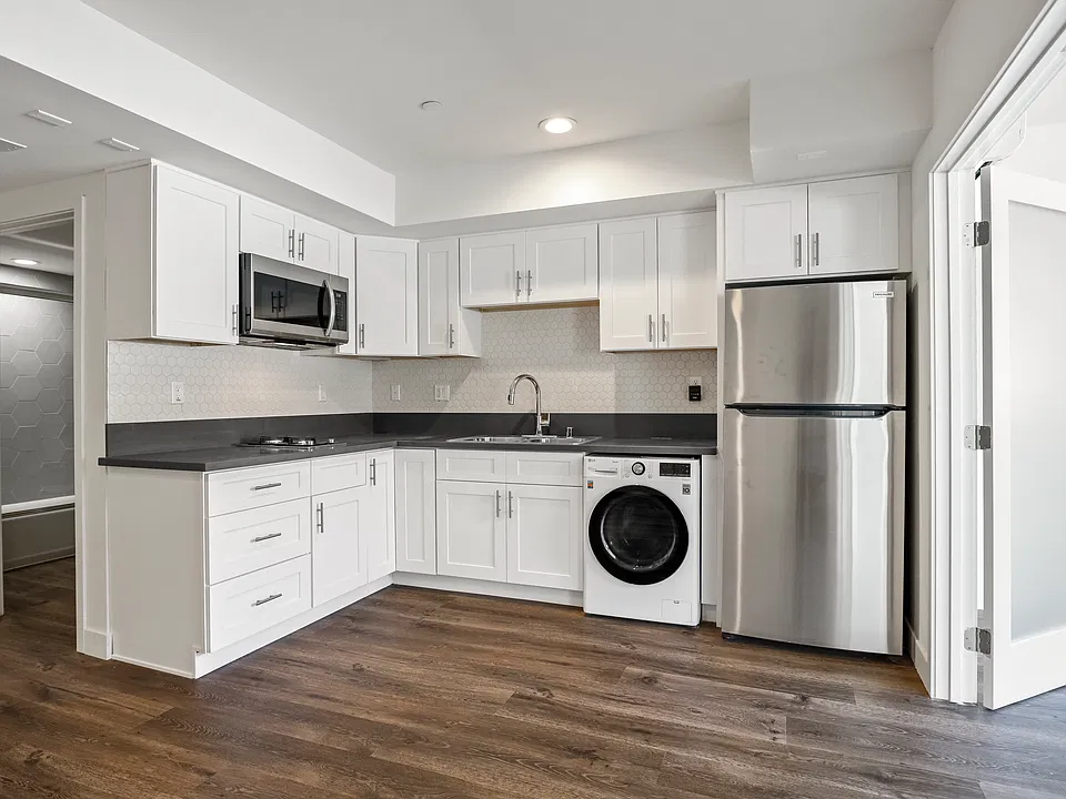Open-Concept Kitchen with Washer and Dryer