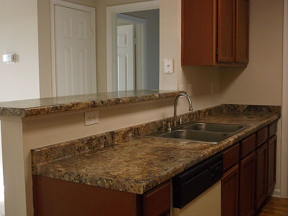 Featuring Brand New Counter Tops & Cherry Cabinets