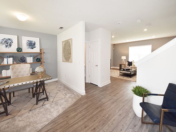 Welcoming entry way with flex space