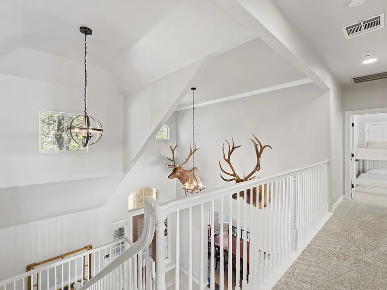 Upstairs balcony into Foyer
