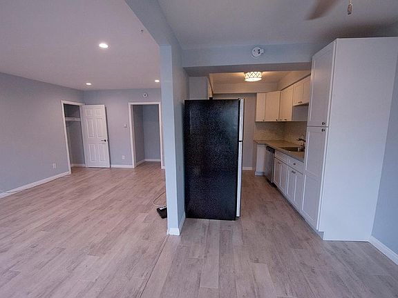 Living Room to the left, dining area directly in front and kitchen behind
