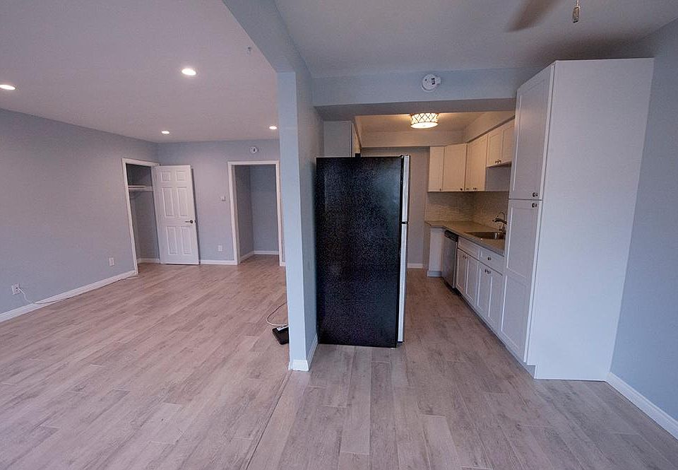 Living Room to the left, dining area directly in front and kitchen behind