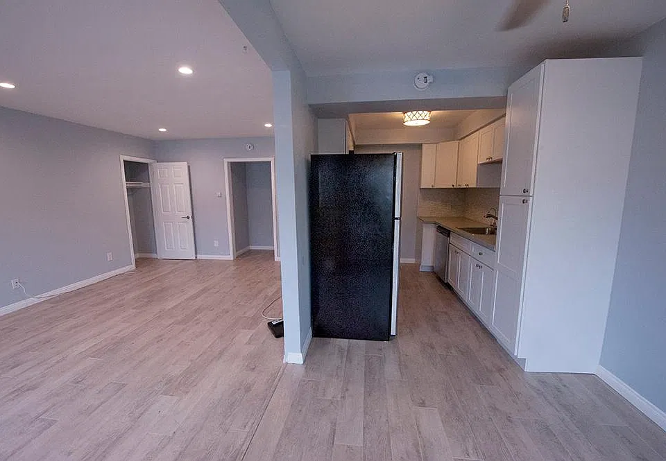 Living Room to the left, dining area directly in front and kitchen behind