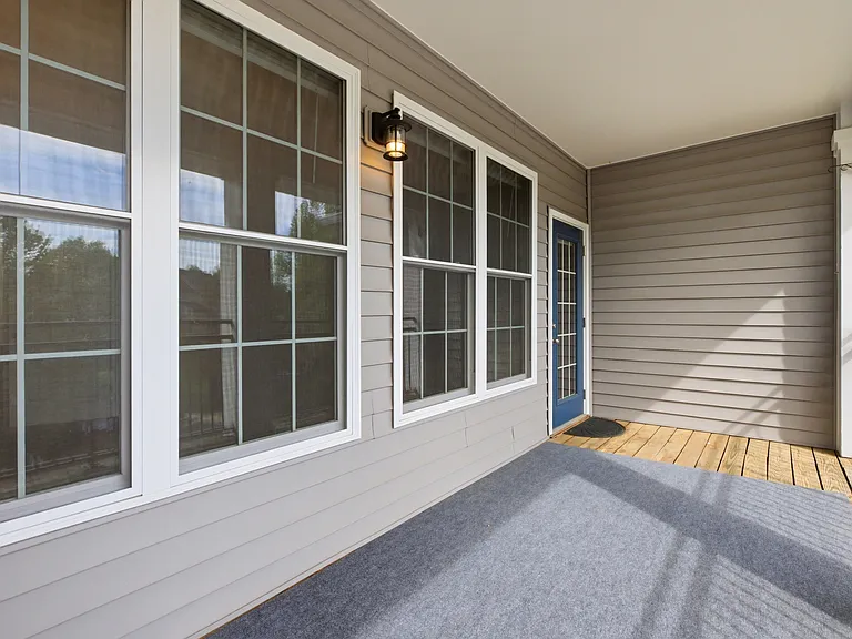 Inviting porch with natural light.