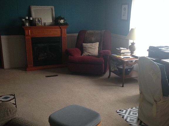 Den with gas fireplace 