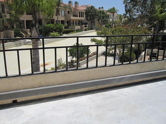 BALCONY VIEW OF NEIGHBORHOOD.