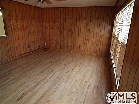 Hardwood floors in living room, hall and bedrooms