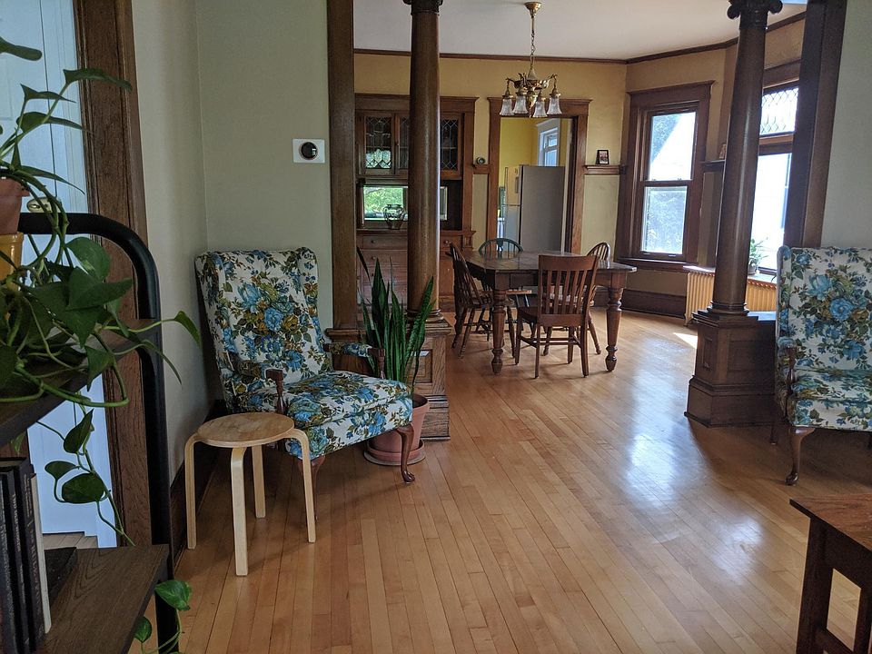 From the Living room, looking through the columns to the Dining room.