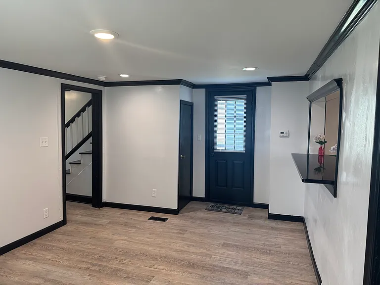 Living room with side door exit to car