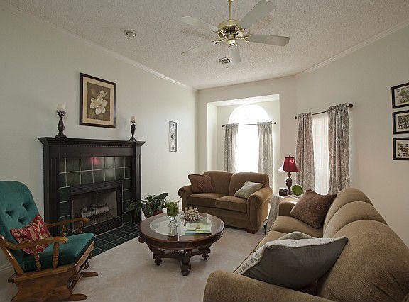 Gas log fireplace with vibrant tile