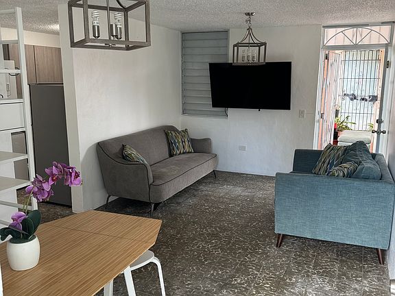 Living and dining room. Looking at front door