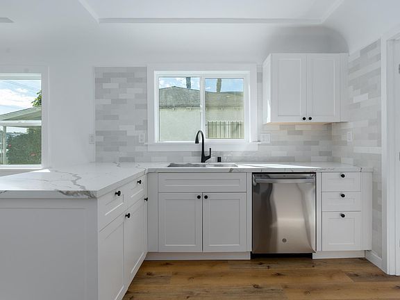 Newly remodeled kitchen with all new appliances, Subway backsplash & Quartz countertops
