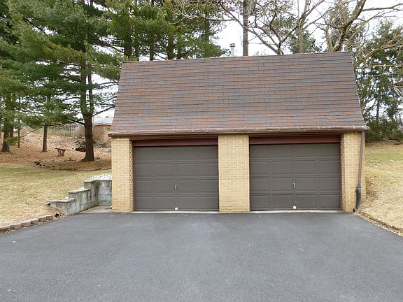 2-car garage, storage above