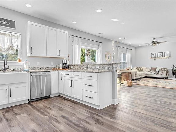Kitchen opens to Family Room