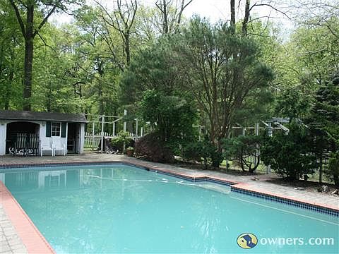 View of pool in backyard
