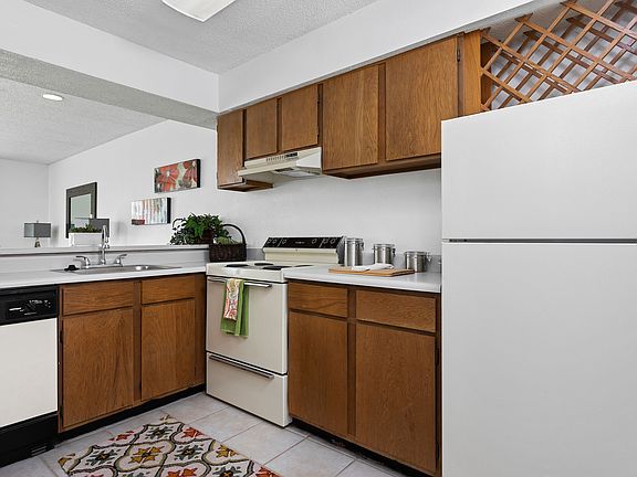 Spacious Kitchen View - Invitational Apartments