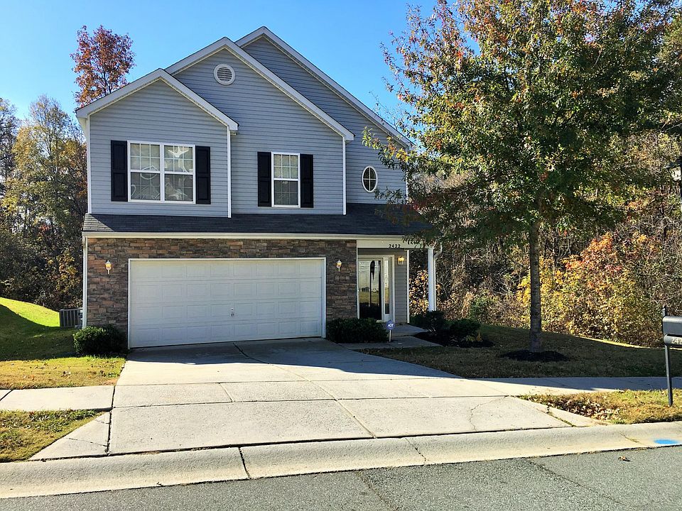 Front of House w/ 2-car garage
