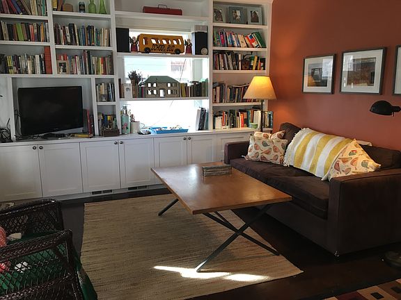 Living Room with built in bookshelves.
