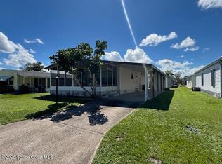 945 Jacaranda Dr, Barefoot Bay, FL 32976
