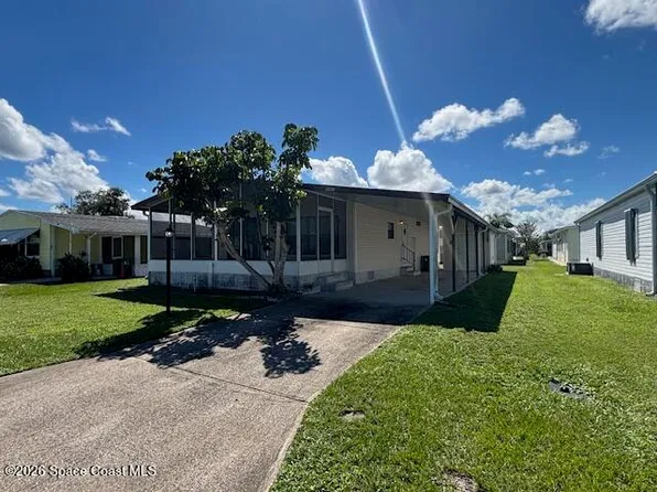 945 Jacaranda Dr, Barefoot Bay, FL 32976