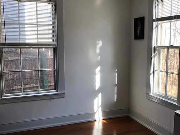Living room area has all new hardwood floors with five large windows letting day light in most of day. Large Rinnai heater is very efficient providing low heat cost for winter months.