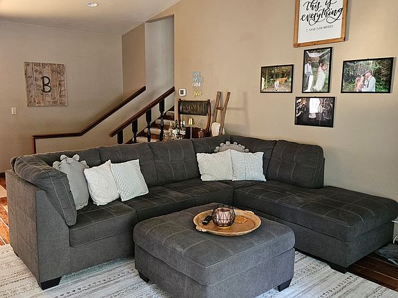 Living room with fireplace and TV hookup